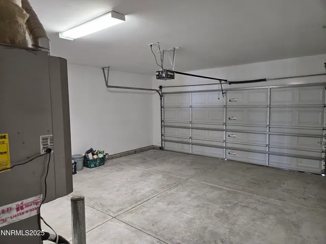 a view of mountain with sunset in background