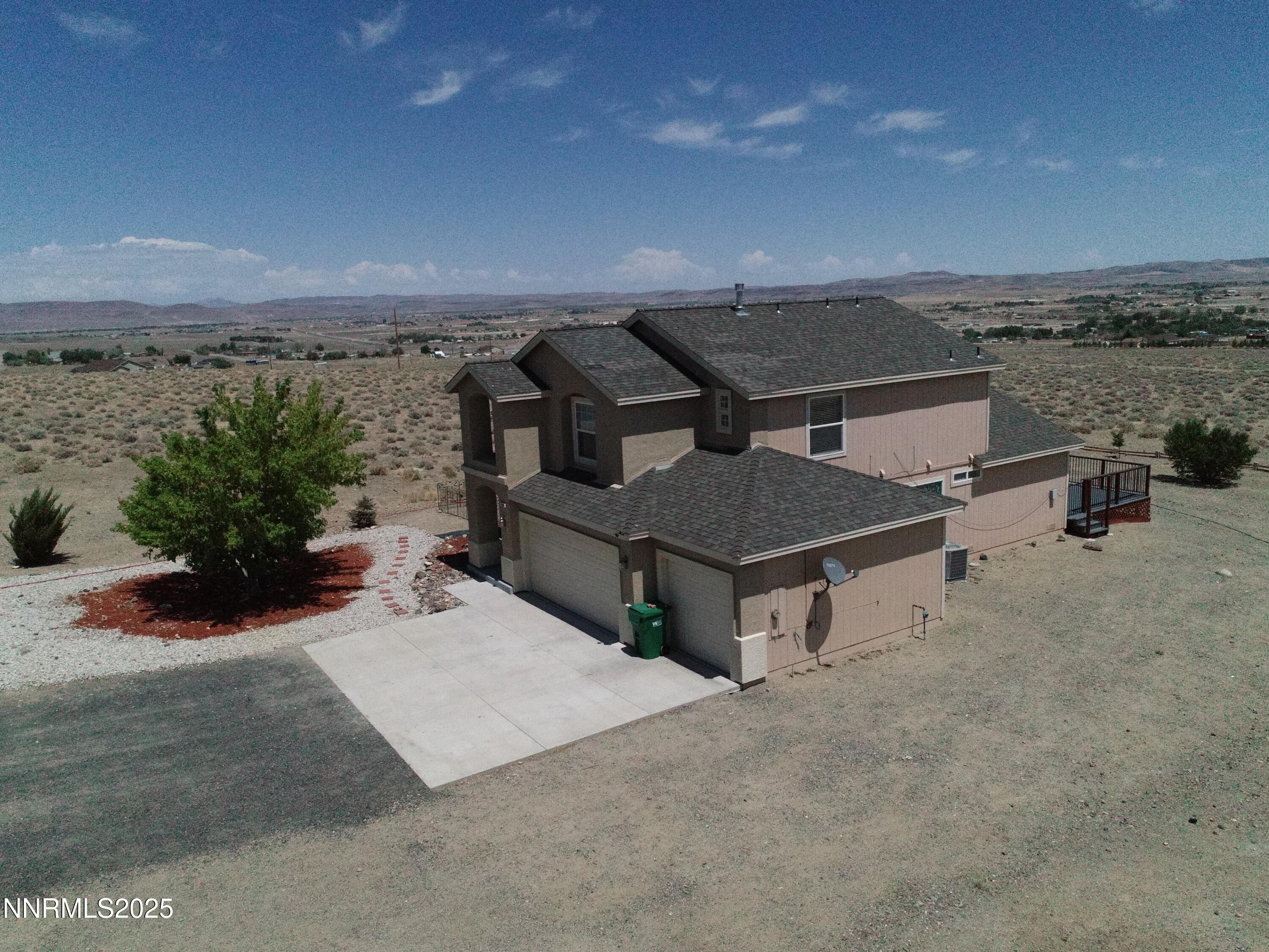 7900 Beech Street Silver Springs, NV 89429 - Photo 35 of 37 an aerial view of a house with yard and terrace