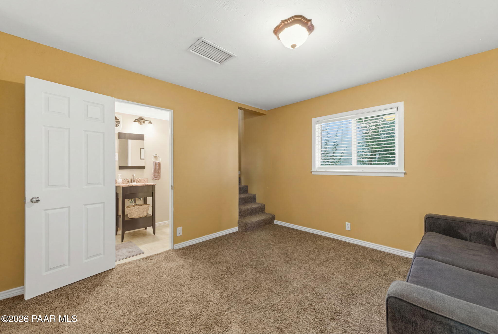 803 East Carleton Street Prescott, AZ 86303 - Photo 17 of 43 a living room with furniture and a window