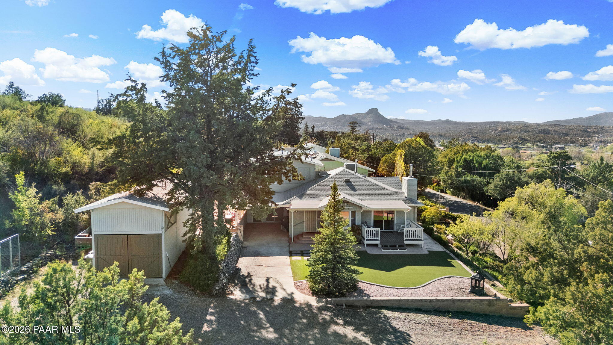 803 East Carleton Street Prescott, AZ 86303 - Photo 26 of 43 a view of a house with a yard and sitting area