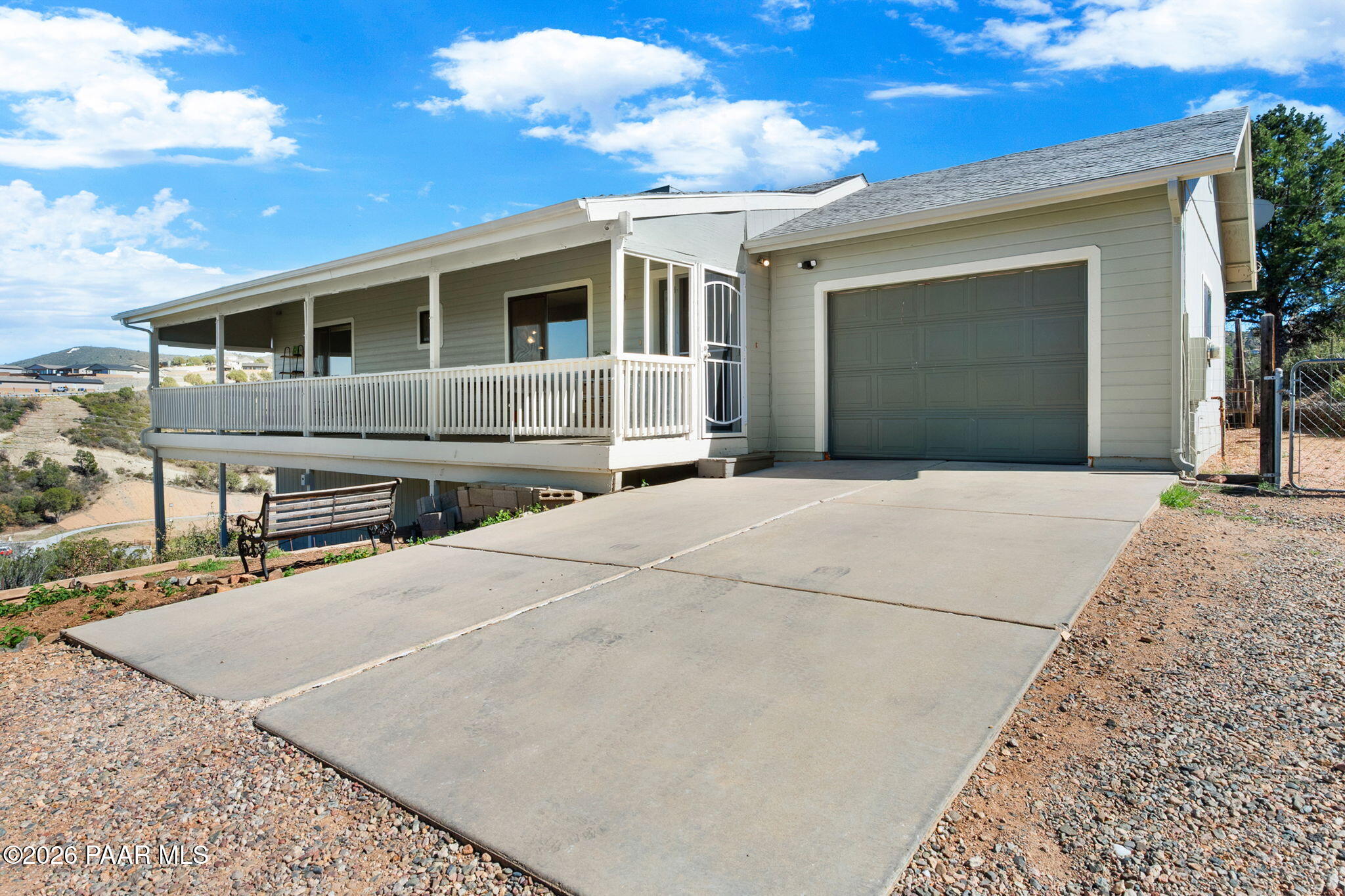 803 East Carleton Street Prescott, AZ 86303 - Photo 29 of 43 a front view of a house with a yard and garage
