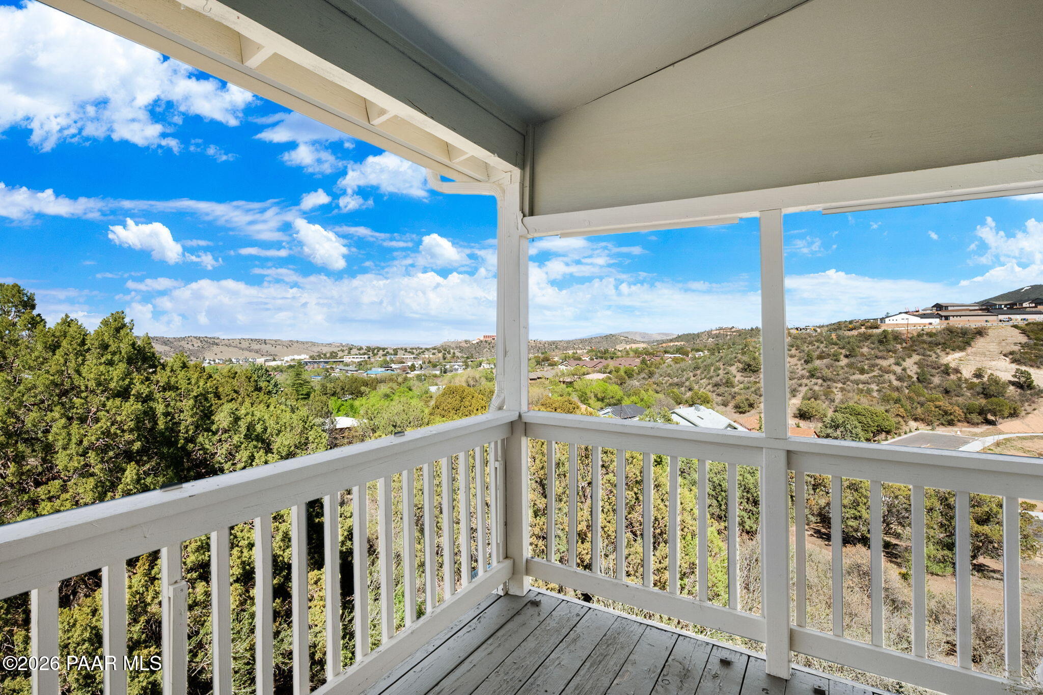 803 East Carleton Street Prescott, AZ 86303 - Photo 31 of 43 a view of a wooden balcony with a swing