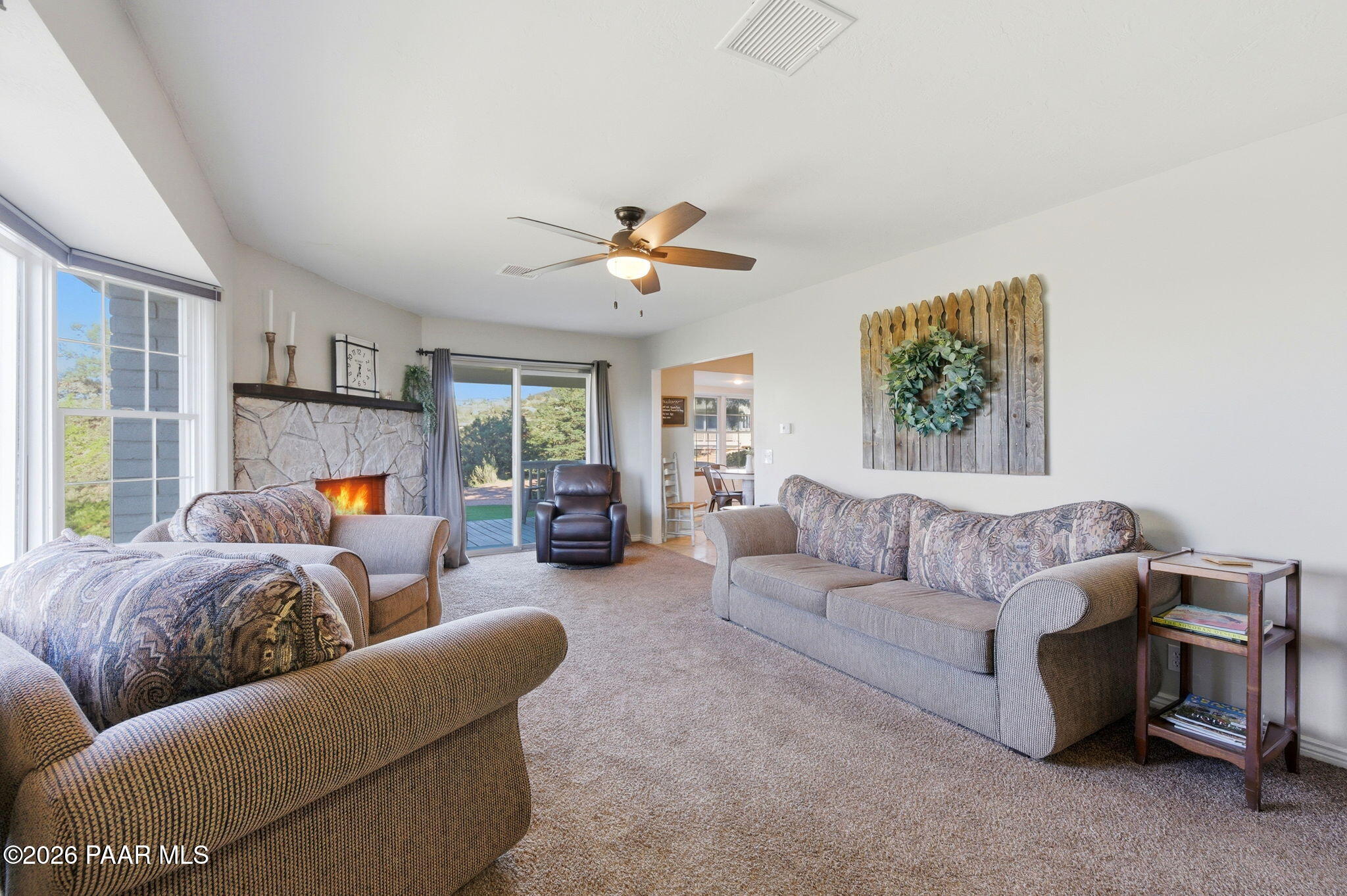 803 East Carleton Street Prescott, AZ 86303 - Photo 5 of 43 a living room with furniture and a chandelier