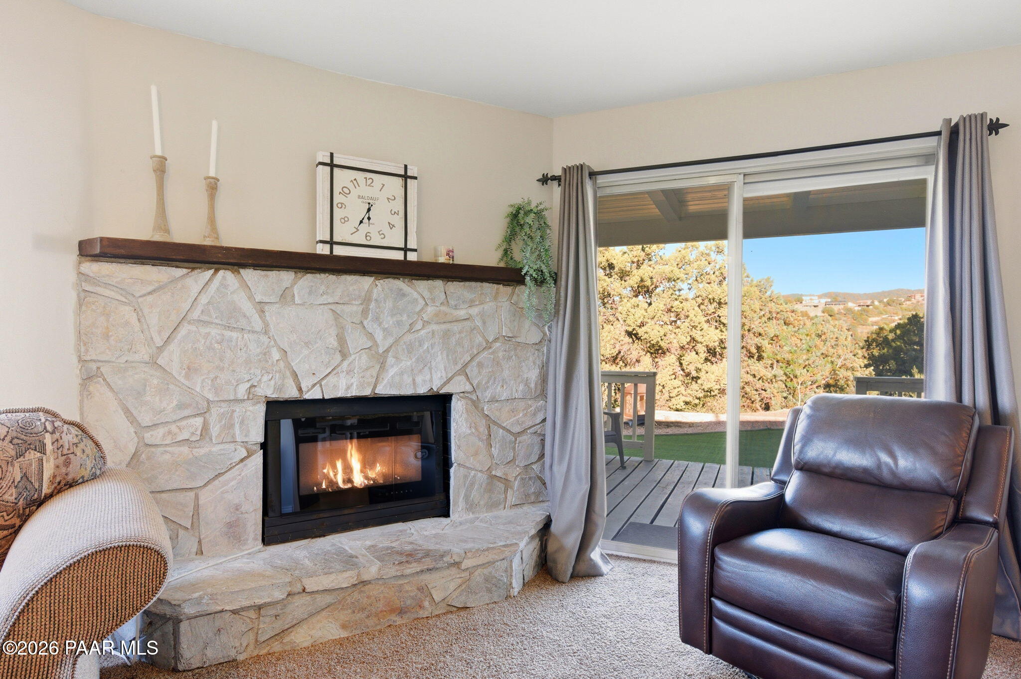 803 East Carleton Street Prescott, AZ 86303 - Photo 8 of 43 a living room with furniture a window and a fireplace