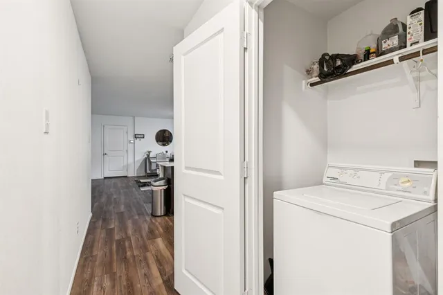 a view of storage and utility room with washer and dryer