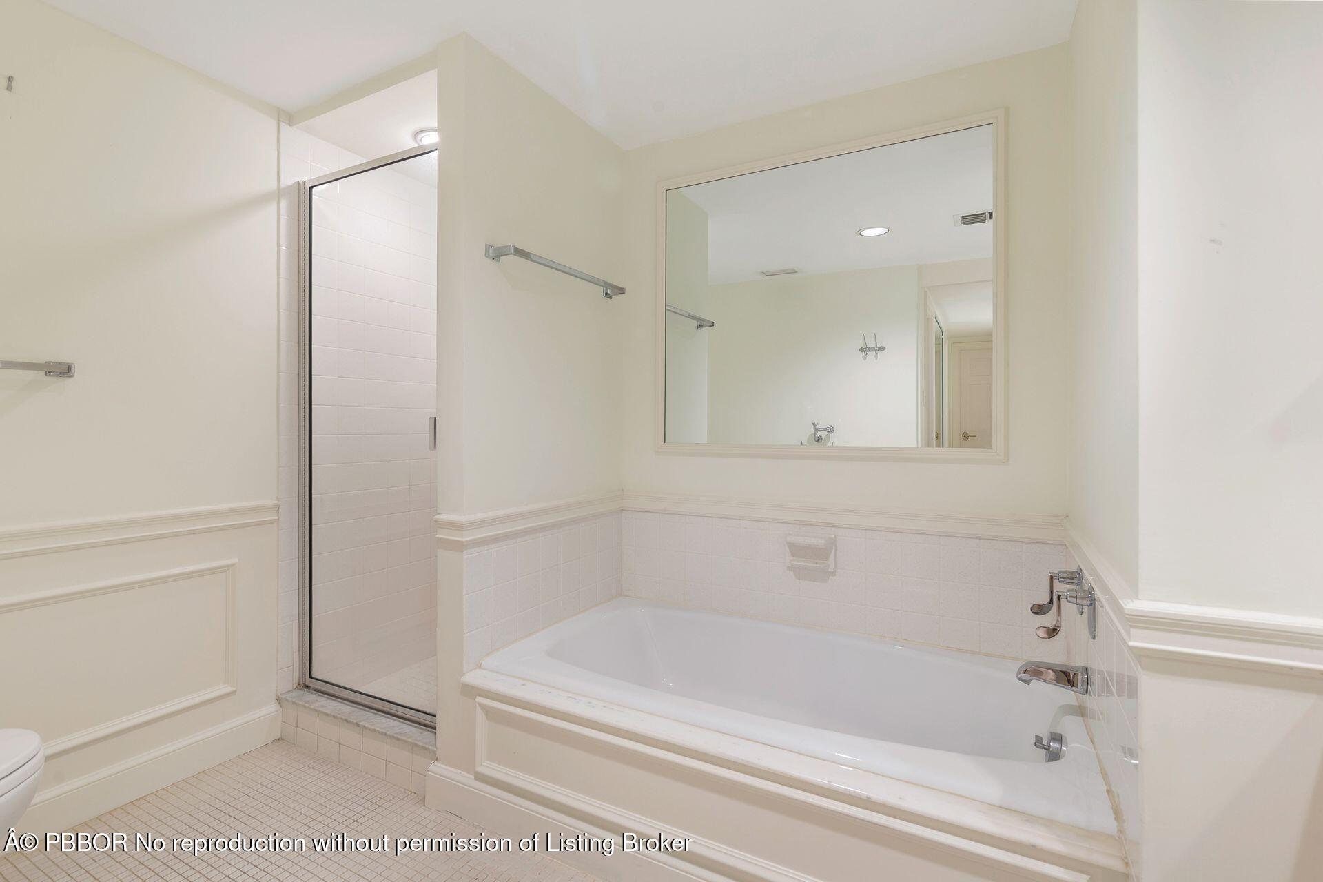 330 Cocoanut Row, Unit 12 Palm Beach, FL 33480 - Photo 12 of 19 a bathroom with a bathtub