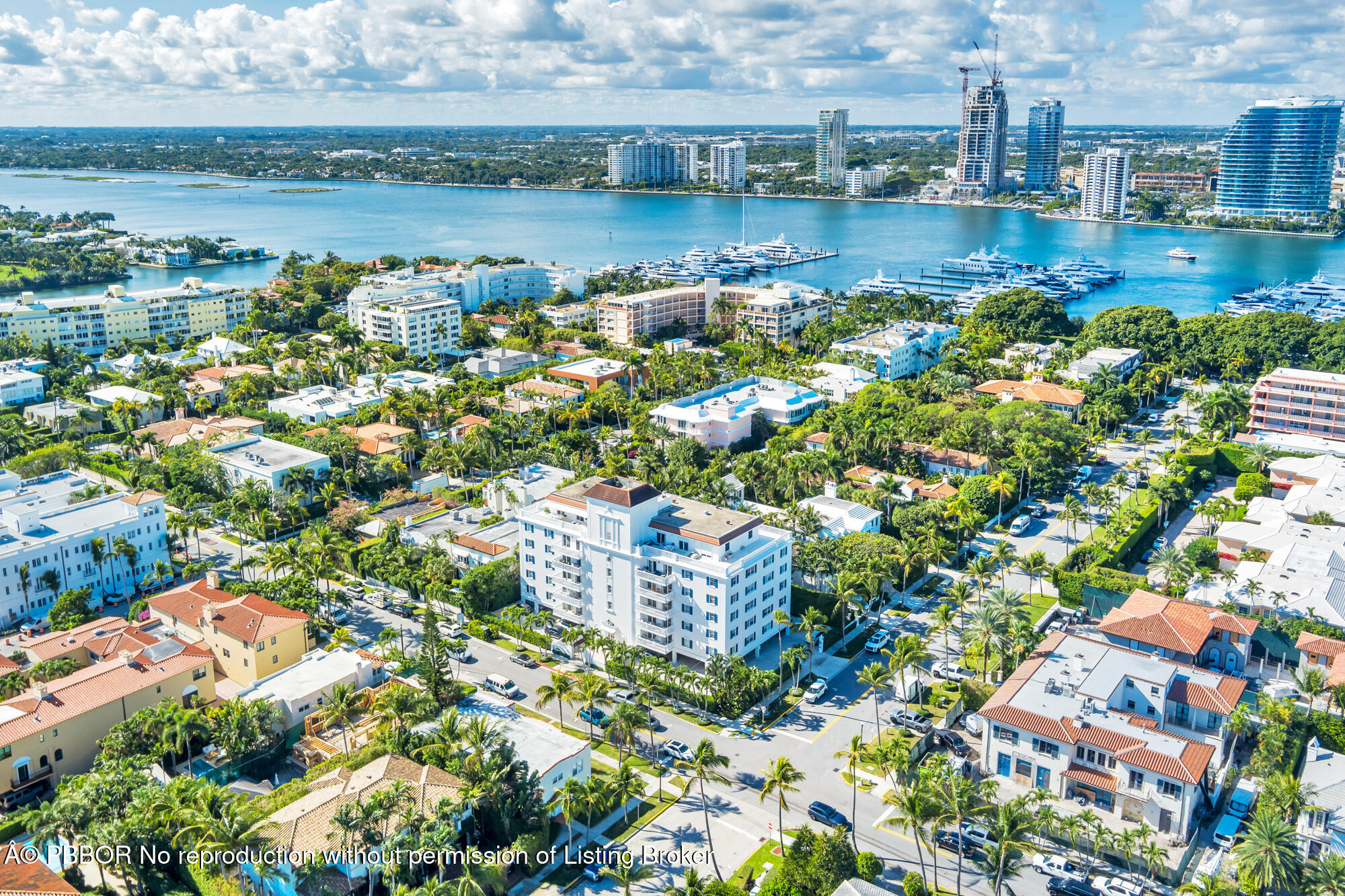 330 Cocoanut Row, Unit 12 Palm Beach, FL 33480 - Photo 17 of 18 a view of a lake with a building in the background