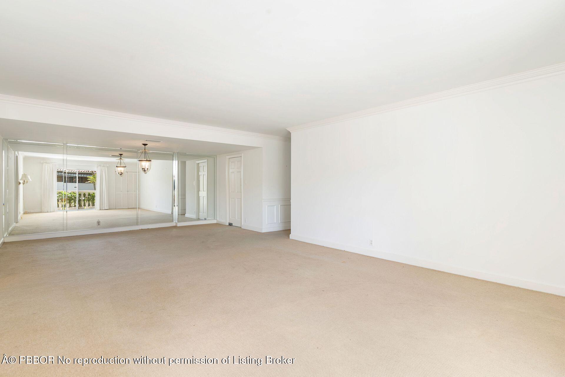 330 Cocoanut Row, Unit 12 Palm Beach, FL 33480 - Photo 6 of 19 a view of an empty room with a window