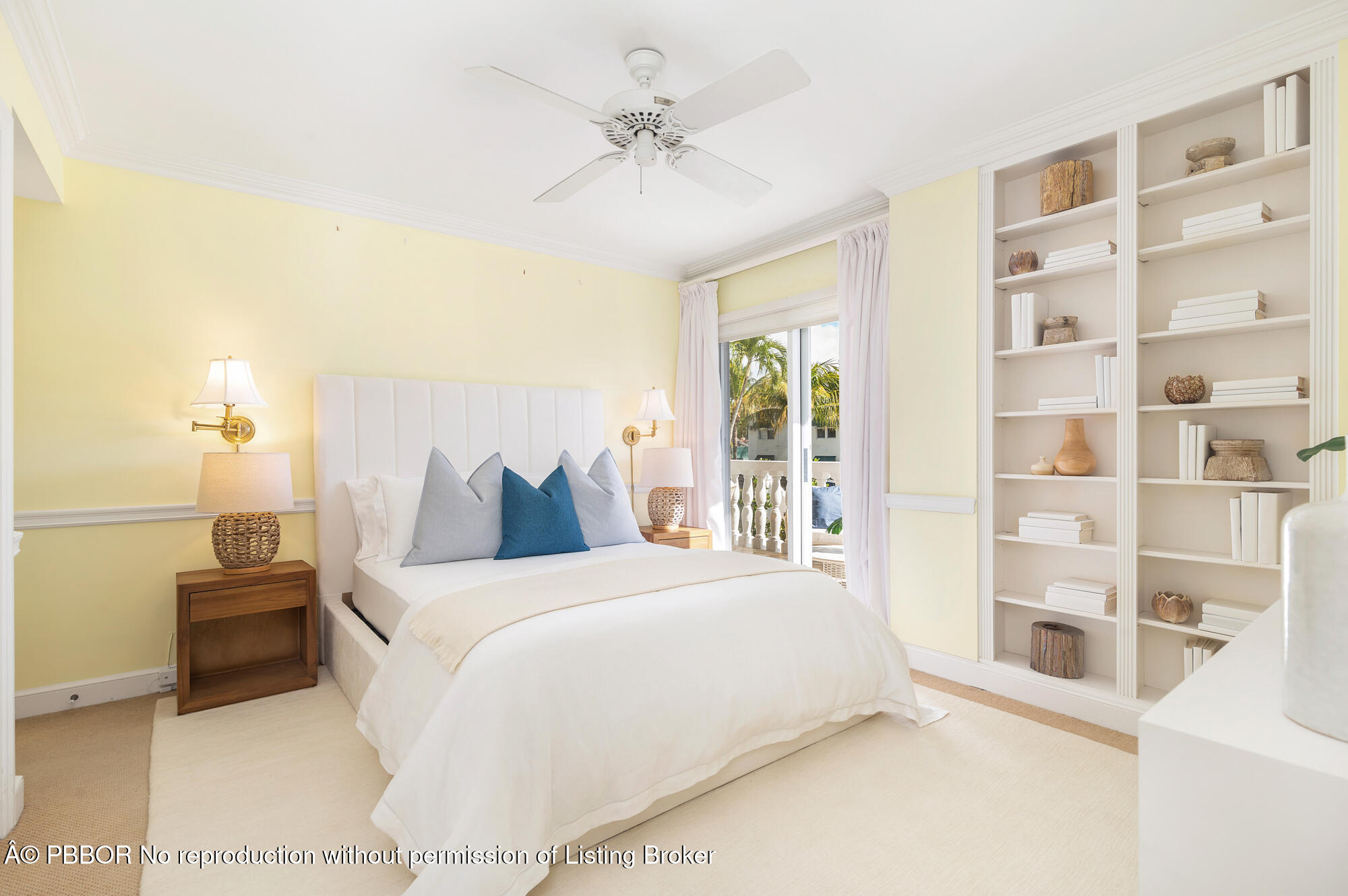330 Cocoanut Row, Unit 12 Palm Beach, FL 33480 - Photo 8 of 18 a bedroom with a large bed and a chandelier