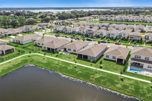 an aerial view of a house with a garden