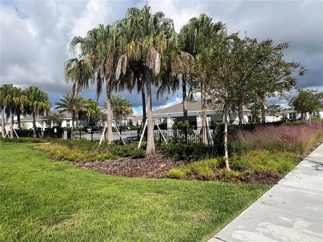 a view of a lake with a big yard