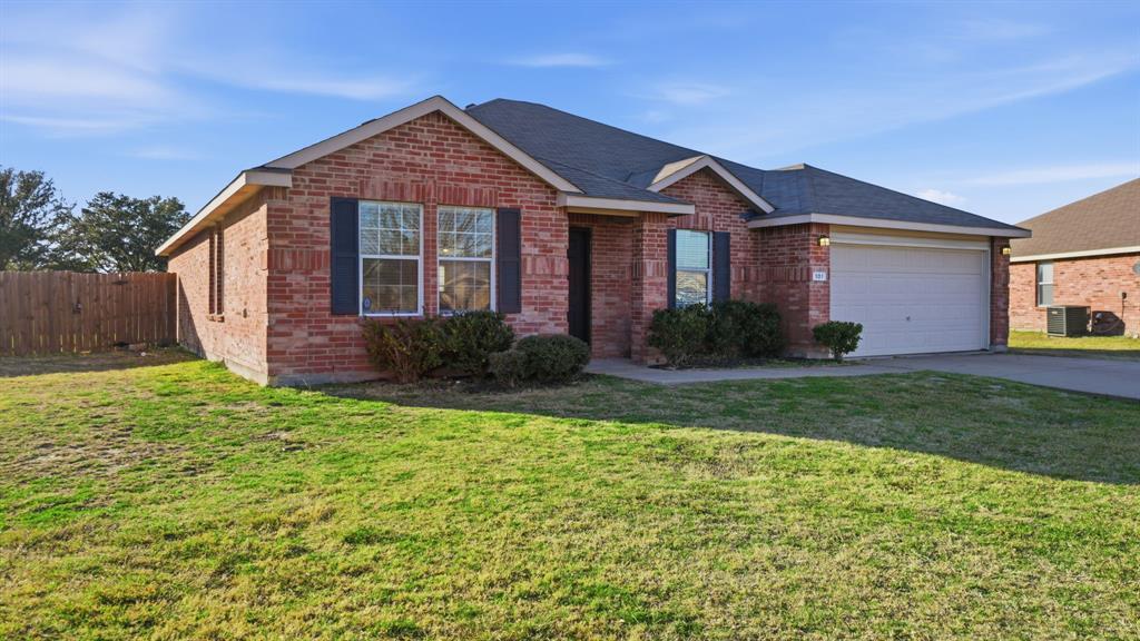101 Long Prairie Drive Forney, TX 75126 - Photo 2 of 40 a front view of a house with garden