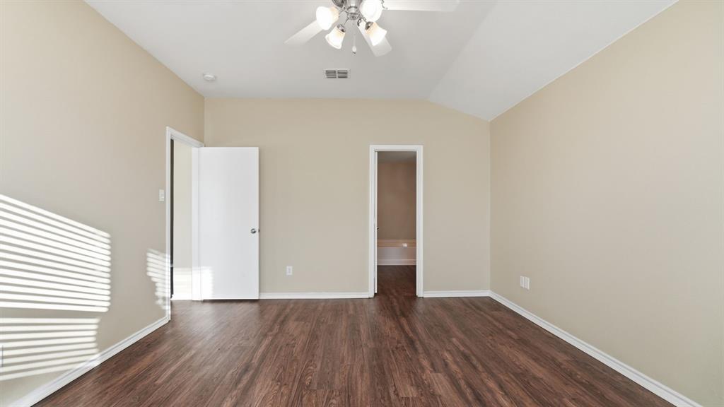 101 Long Prairie Drive Forney, TX 75126 - Photo 26 of 40 wooden floor in an empty room with a window