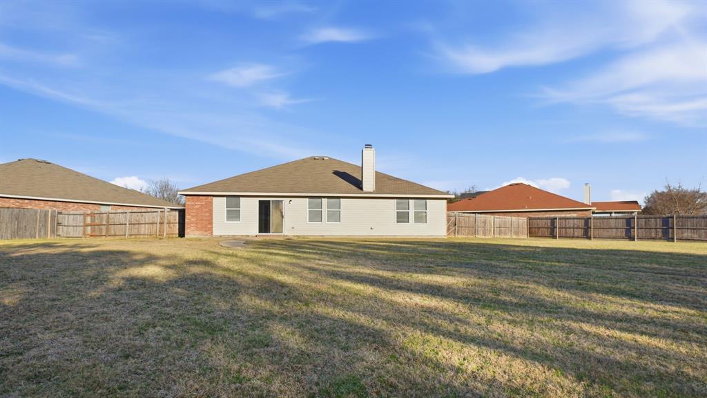 101 Long Prairie Drive Forney, TX 75126 - Photo 38 of 40 a front view of a house with a yard