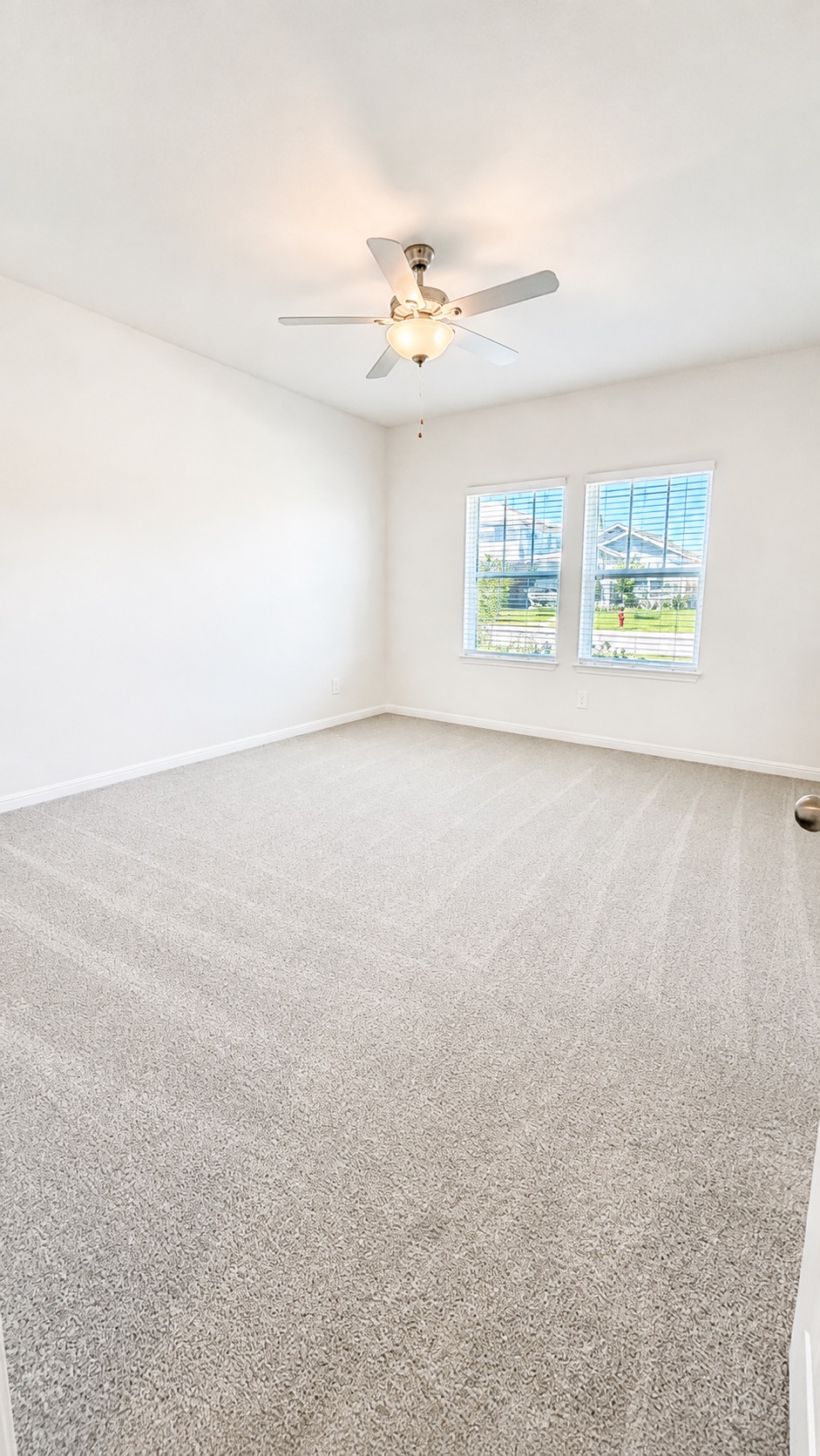 116 Maple Hedge Road Hutto, TX 78634 - Photo 5 of 13 A well-lit bedroom with ample natural light offers a comfortable retreat.