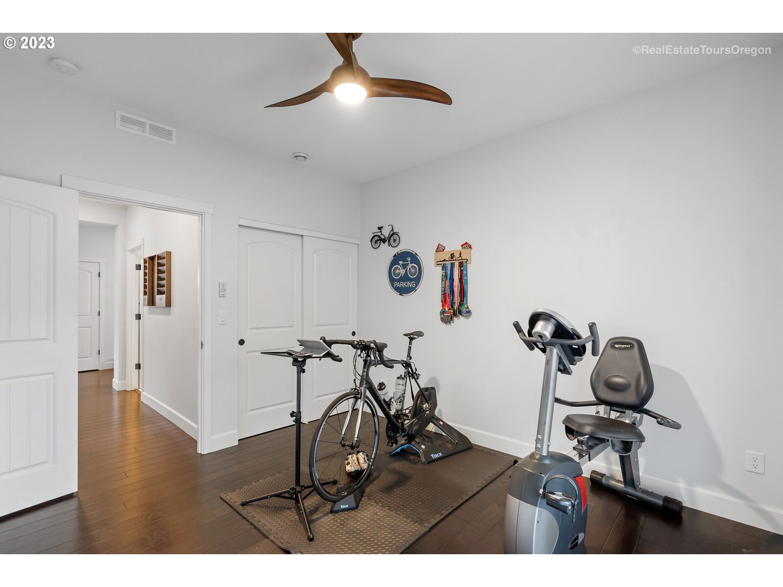4584 North 9th Street Ridgefield, WA 98642 - Photo 14 of 39 a view of a workspace with furniture and gym equipment