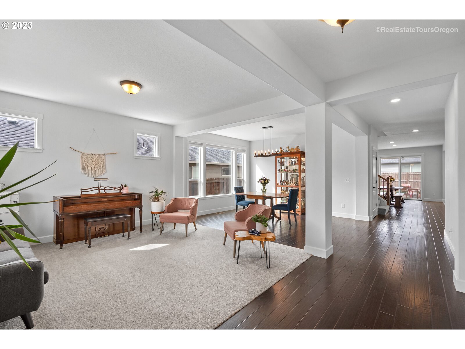 4584 North 9th Street Ridgefield, WA 98642 - Photo 2 of 39 a living room with furniture and a wooden floor