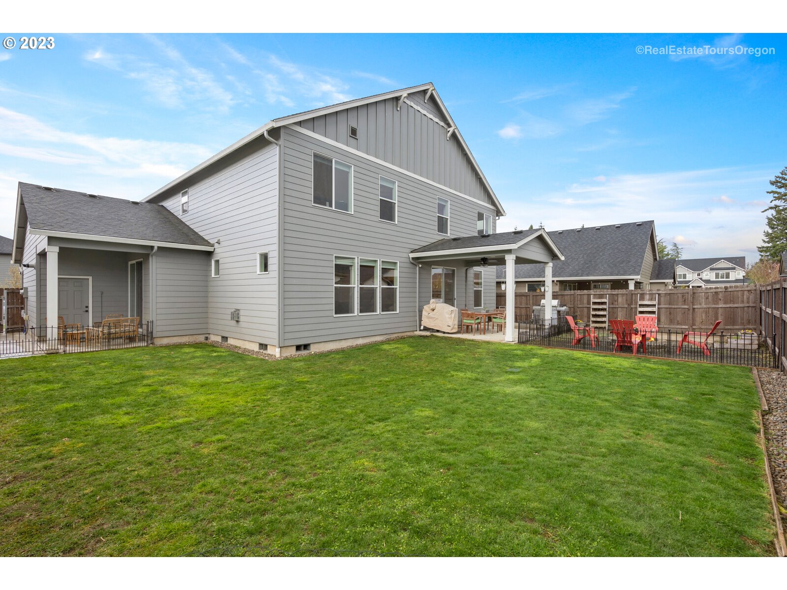 4584 North 9th Street Ridgefield, WA 98642 - Photo 35 of 39 a view of a house with a backyard