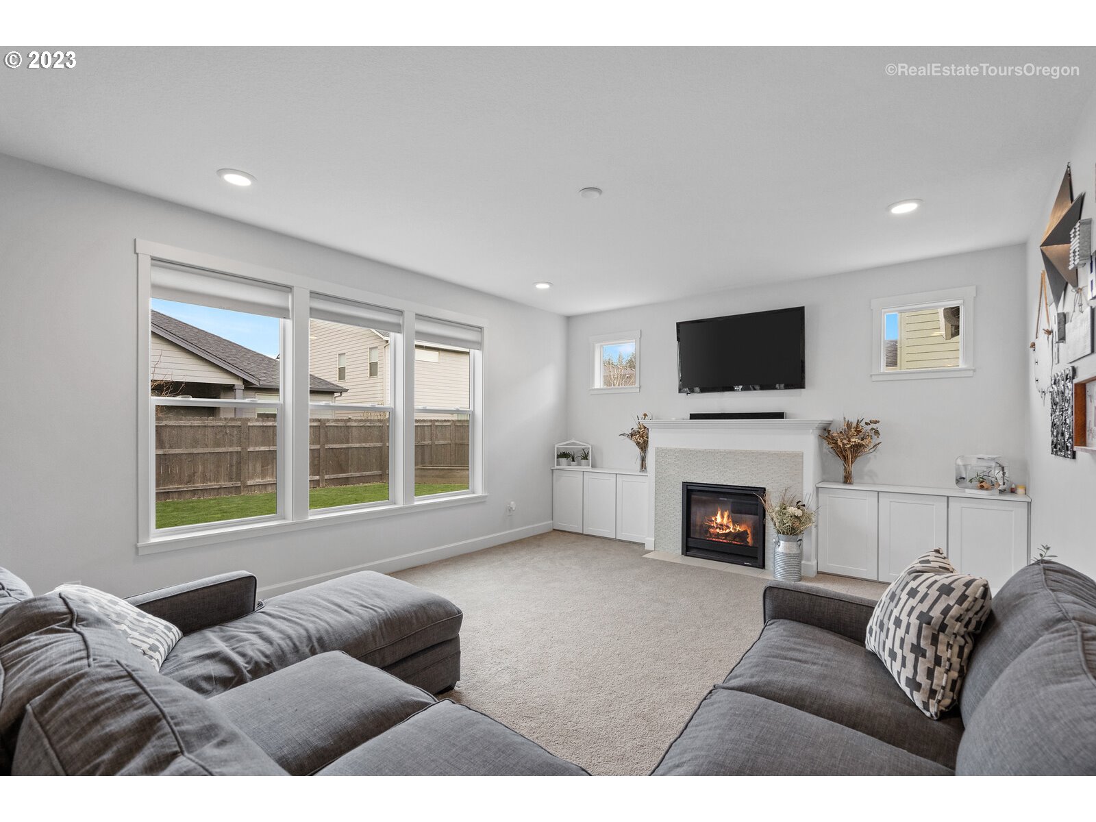 4584 North 9th Street Ridgefield, WA 98642 - Photo 10 of 39 a living room with furniture and a fireplace