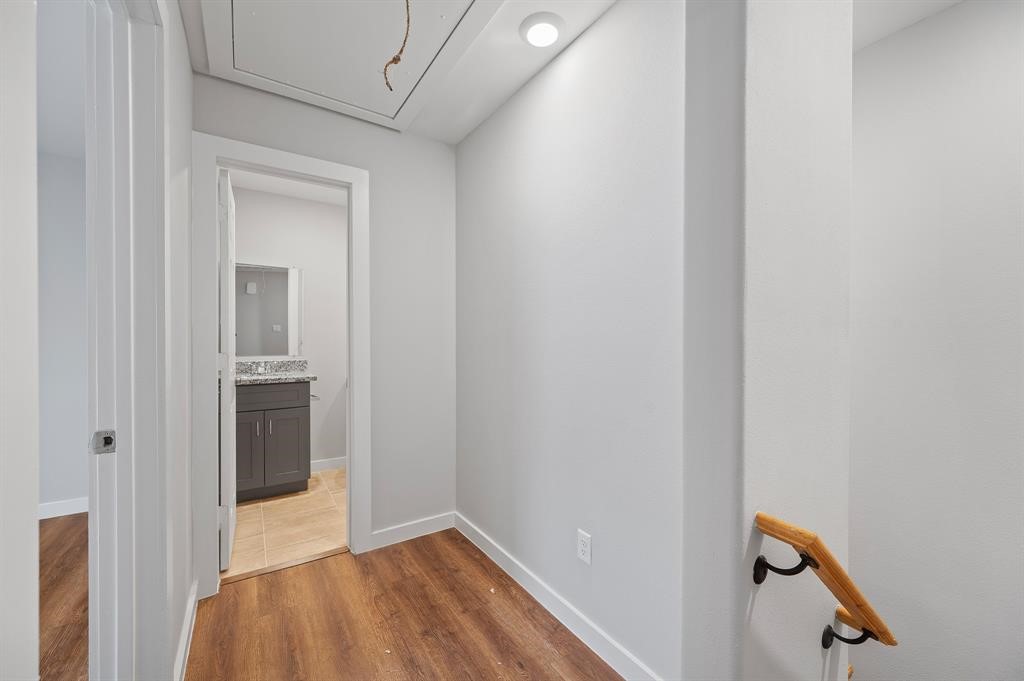 7804 Crestview Drive, Unit B Houston, TX 77028 - Photo 11 of 23 a view of a hallway with wooden floor