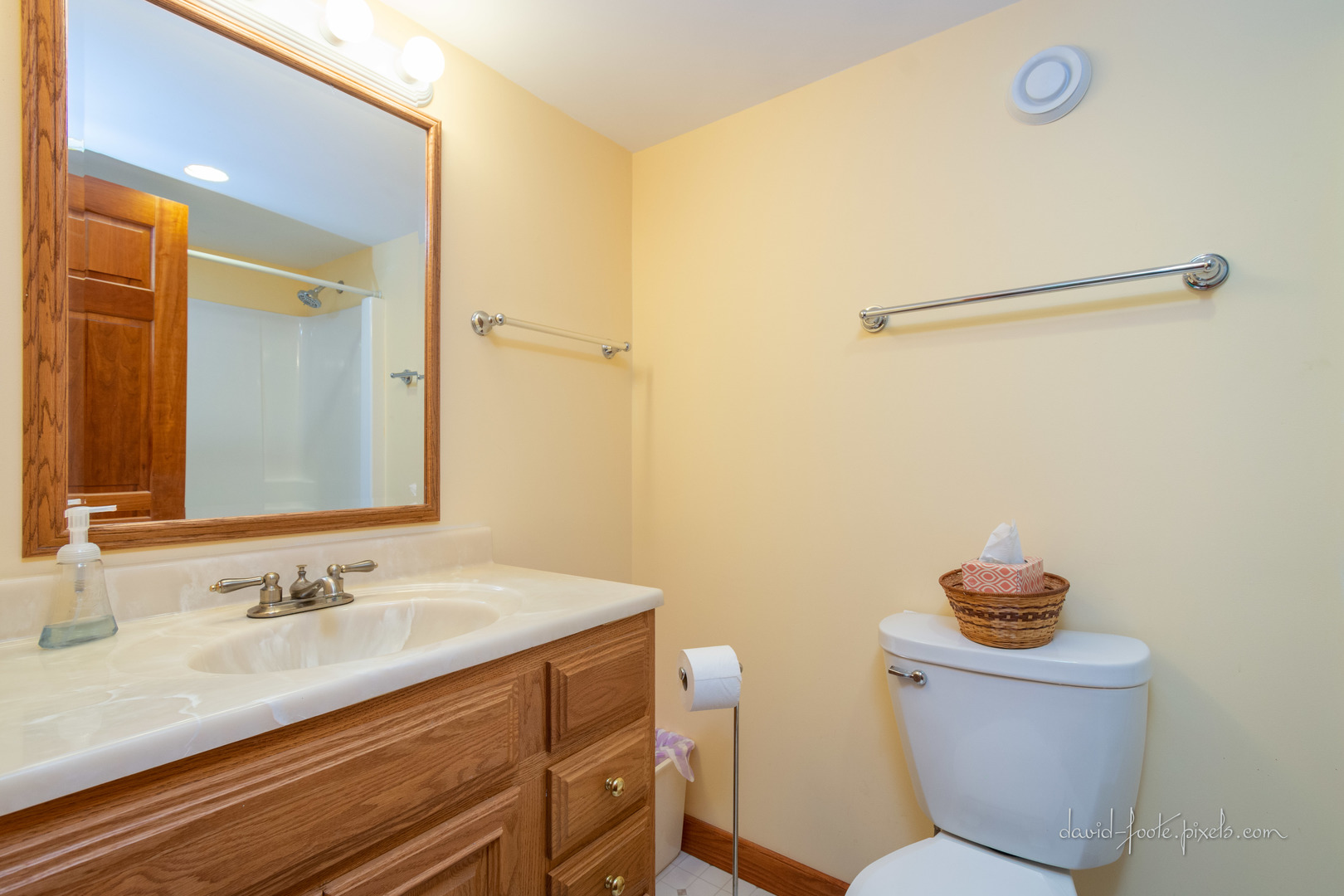 18 Lookout Trace Galena, IL 61036 - Photo 17 of 56 a bathroom with a granite countertop sink a toilet a mirror and shower