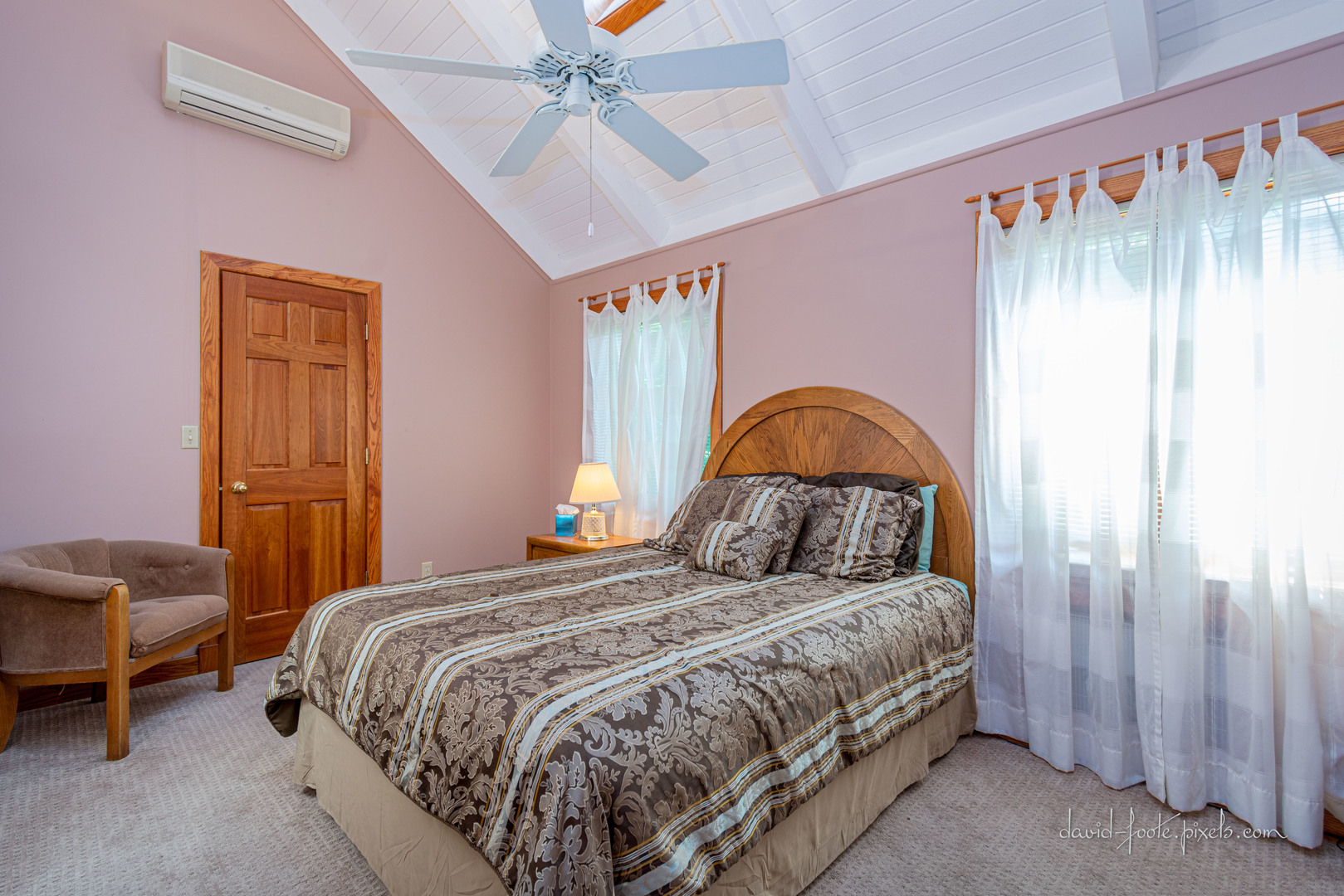 18 Lookout Trace Galena, IL 61036 - Photo 21 of 56 a bedroom with a bed and a chandelier