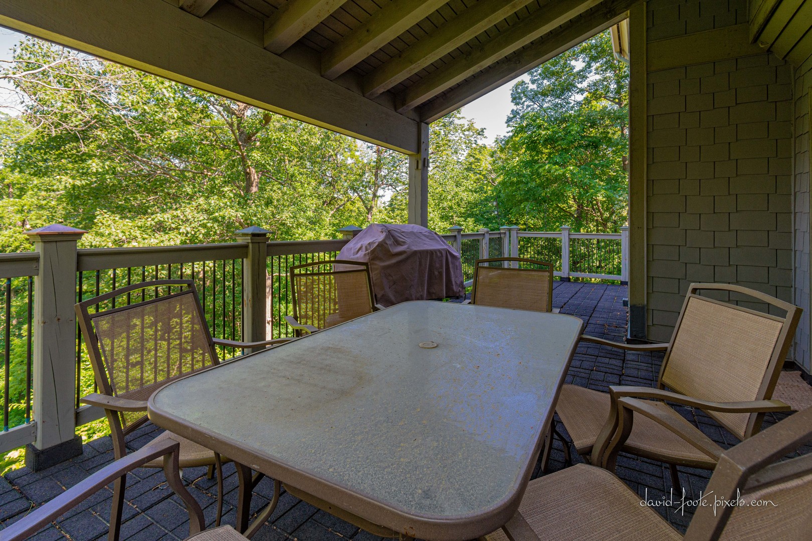 18 Lookout Trace Galena, IL 61036 - Photo 23 of 56 a view of a patio with a table chairs and a backyard