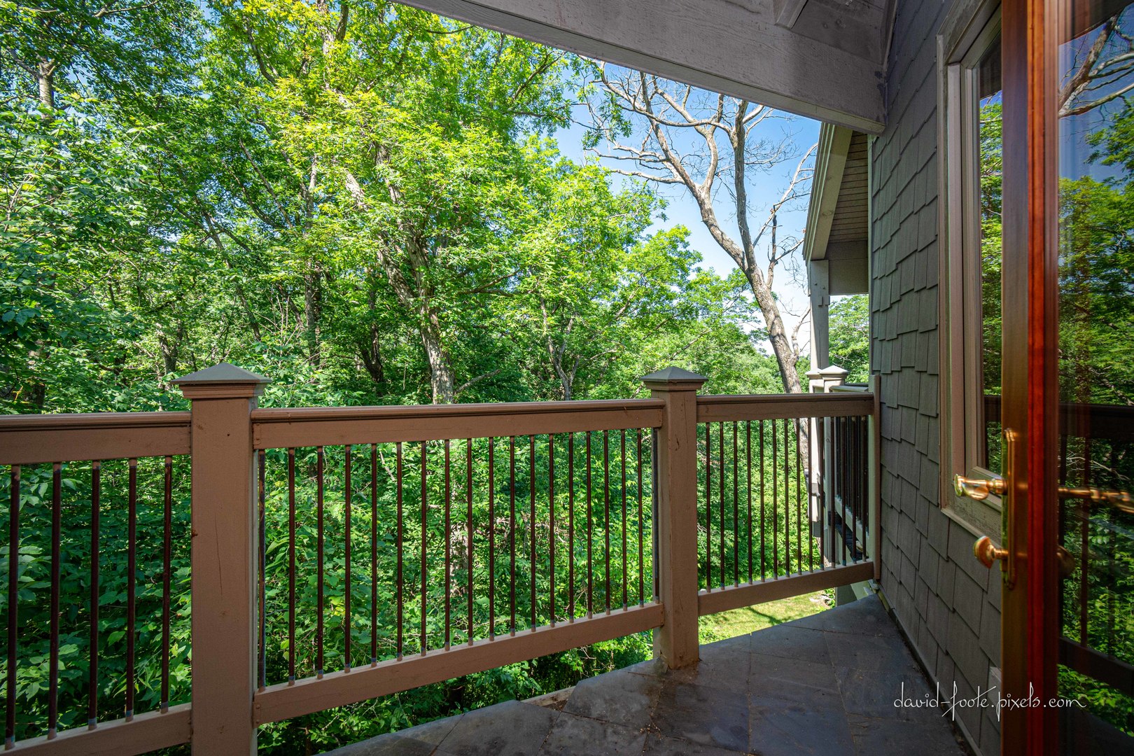 18 Lookout Trace Galena, IL 61036 - Photo 29 of 56 a view of a balcony with wooden floor