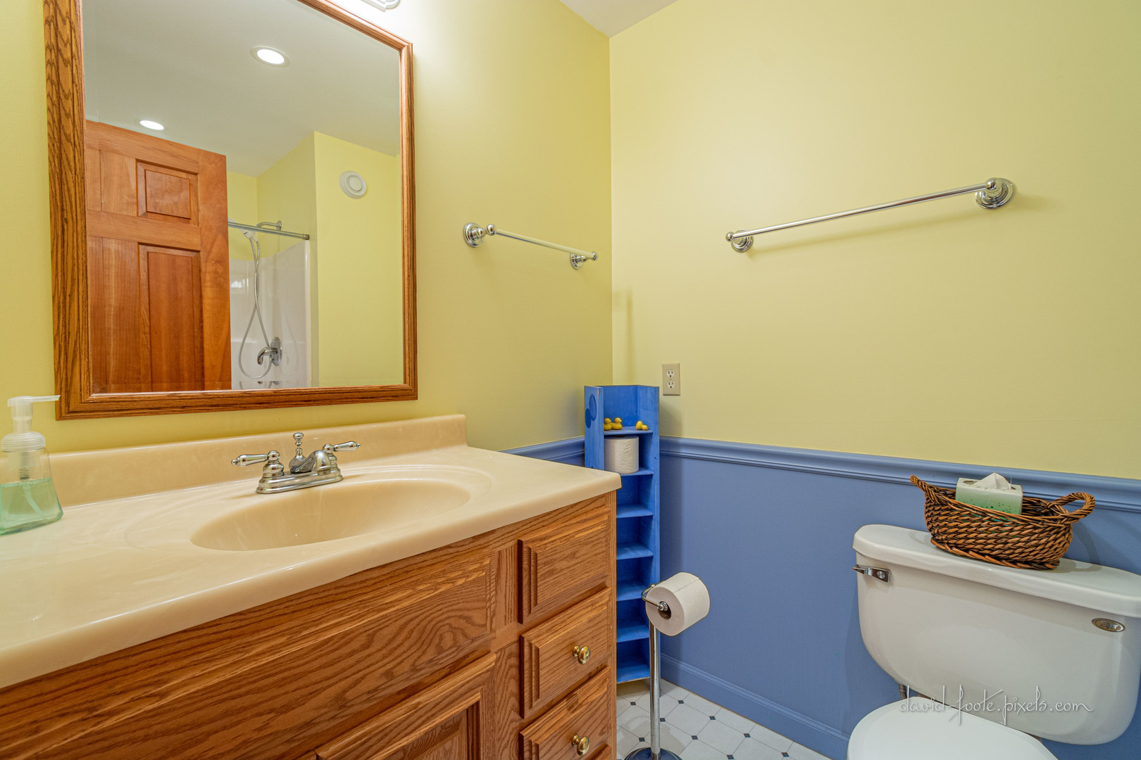 18 Lookout Trace Galena, IL 61036 - Photo 31 of 56 a bathroom with a sink a toilet a mirror and vanity