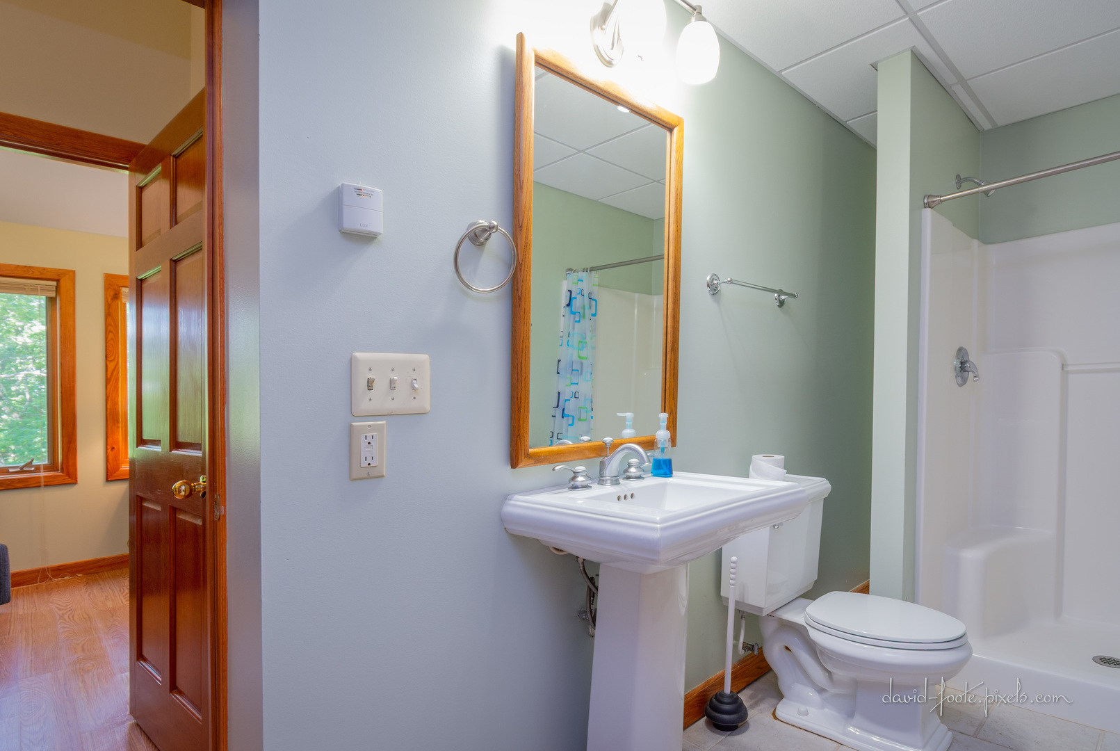 18 Lookout Trace Galena, IL 61036 - Photo 45 of 56 a bathroom with a sink toilet and mirror