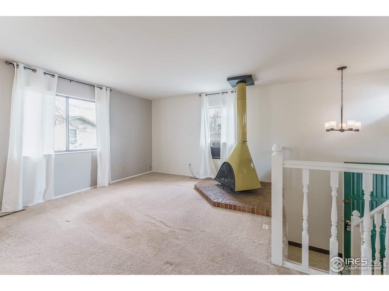 1225 Centaur Circle, Unit A Lafayette, CO 80026 - Photo 11 of 35 a view of an empty room with a window