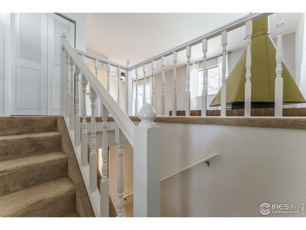 1225 Centaur Circle, Unit A Lafayette, CO 80026 - Photo 13 of 35 a view of entryway and hall with wooden floor