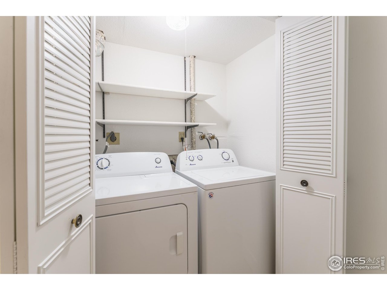 1225 Centaur Circle, Unit A Lafayette, CO 80026 - Photo 20 of 35 a utility room with dryer and washer