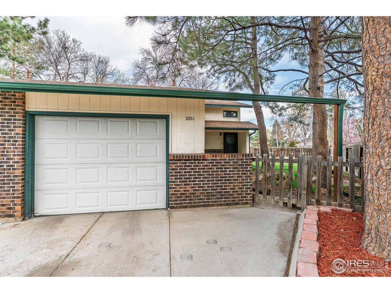 1225 Centaur Circle, Unit A Lafayette, CO 80026 - Photo 22 of 35 a view of a house with a outdoor space