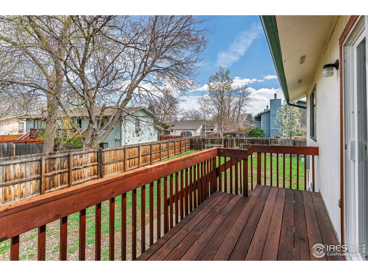 1225 Centaur Circle, Unit A Lafayette, CO 80026 - Photo 25 of 35 a view of balcony with wooden floor
