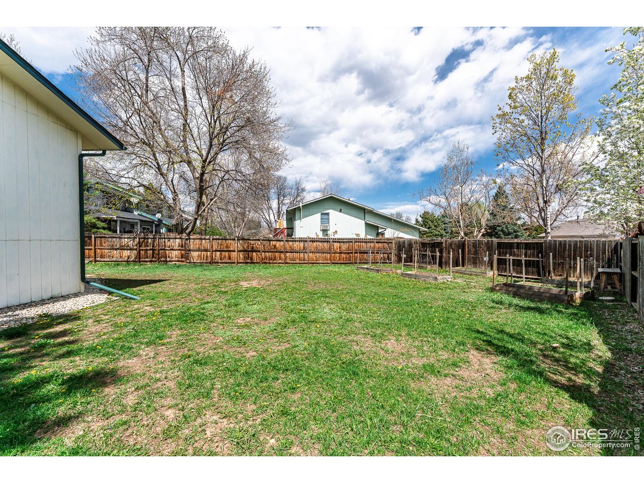 1225 Centaur Circle, Unit A Lafayette, CO 80026 - Photo 32 of 35 a view of house with garden
