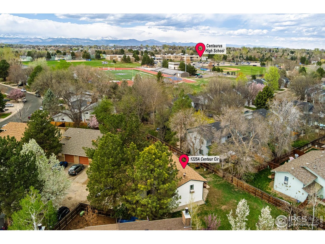1225 Centaur Circle, Unit A Lafayette, CO 80026 - Photo 34 of 35 a view of a lake with a houses