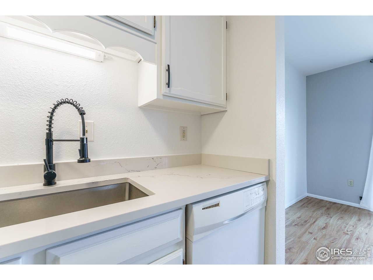1225 Centaur Circle, Unit A Lafayette, CO 80026 - Photo 6 of 35 a close view of sink and tap