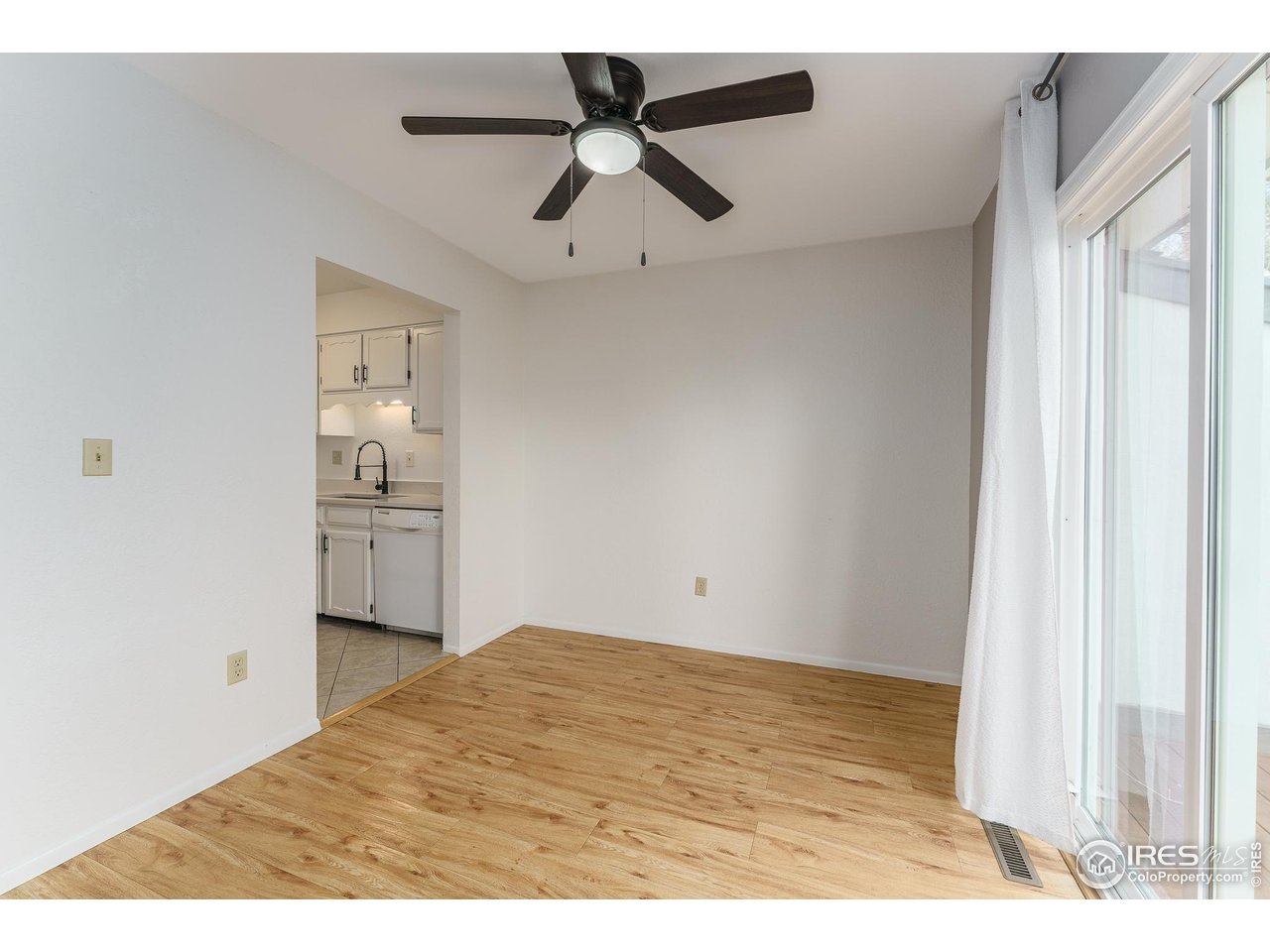 1225 Centaur Circle, Unit A Lafayette, CO 80026 - Photo 7 of 35 a view of empty room with wooden floor
