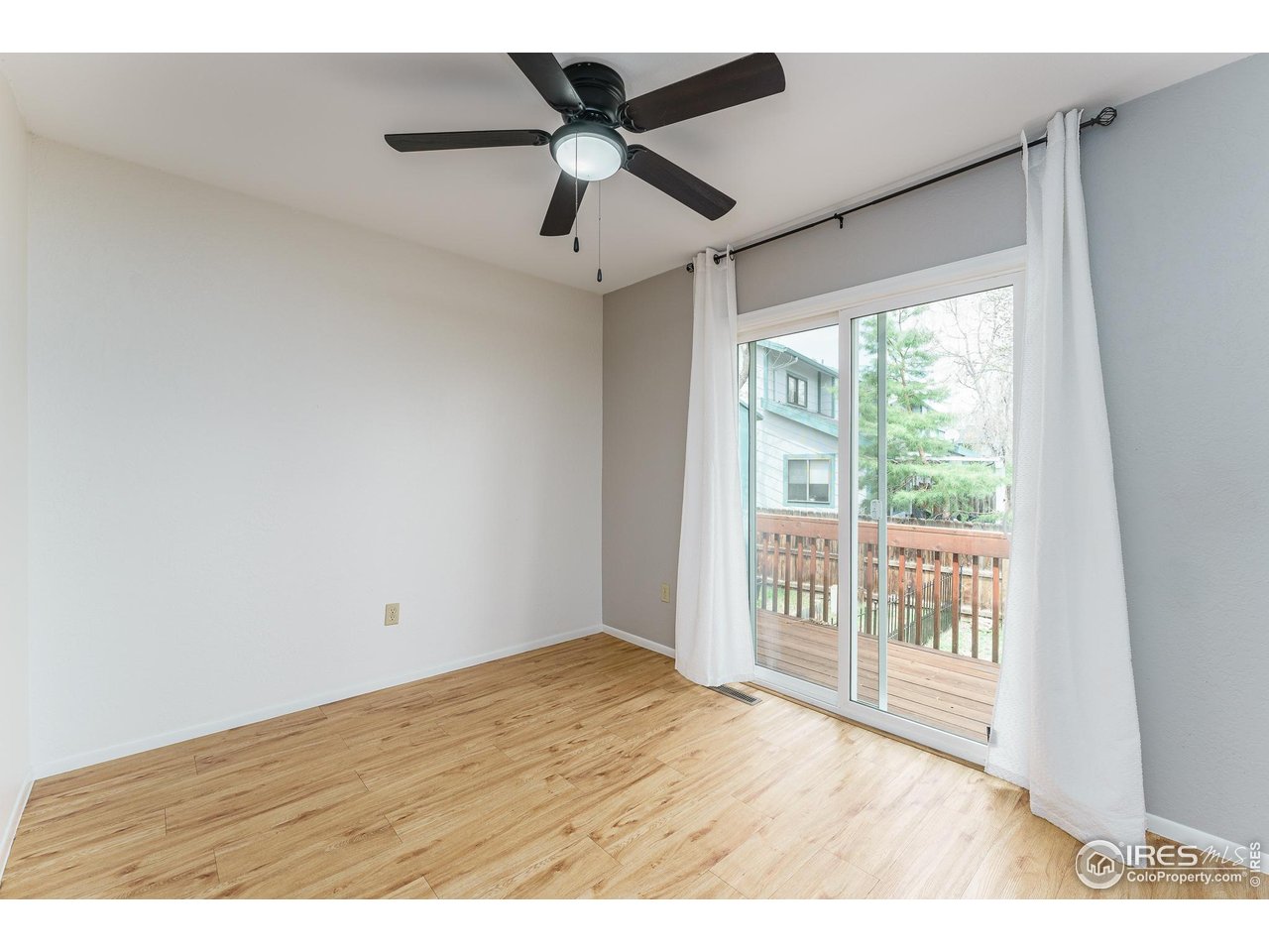 1225 Centaur Circle, Unit A Lafayette, CO 80026 - Photo 8 of 35 a view of an empty room and window