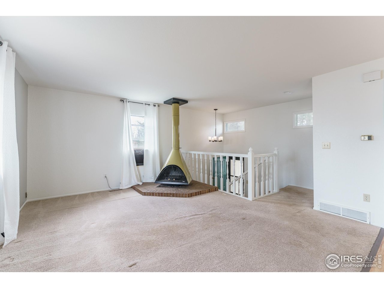 1225 Centaur Circle, Unit A Lafayette, CO 80026 - Photo 10 of 35 a view of an empty room and kitchen
