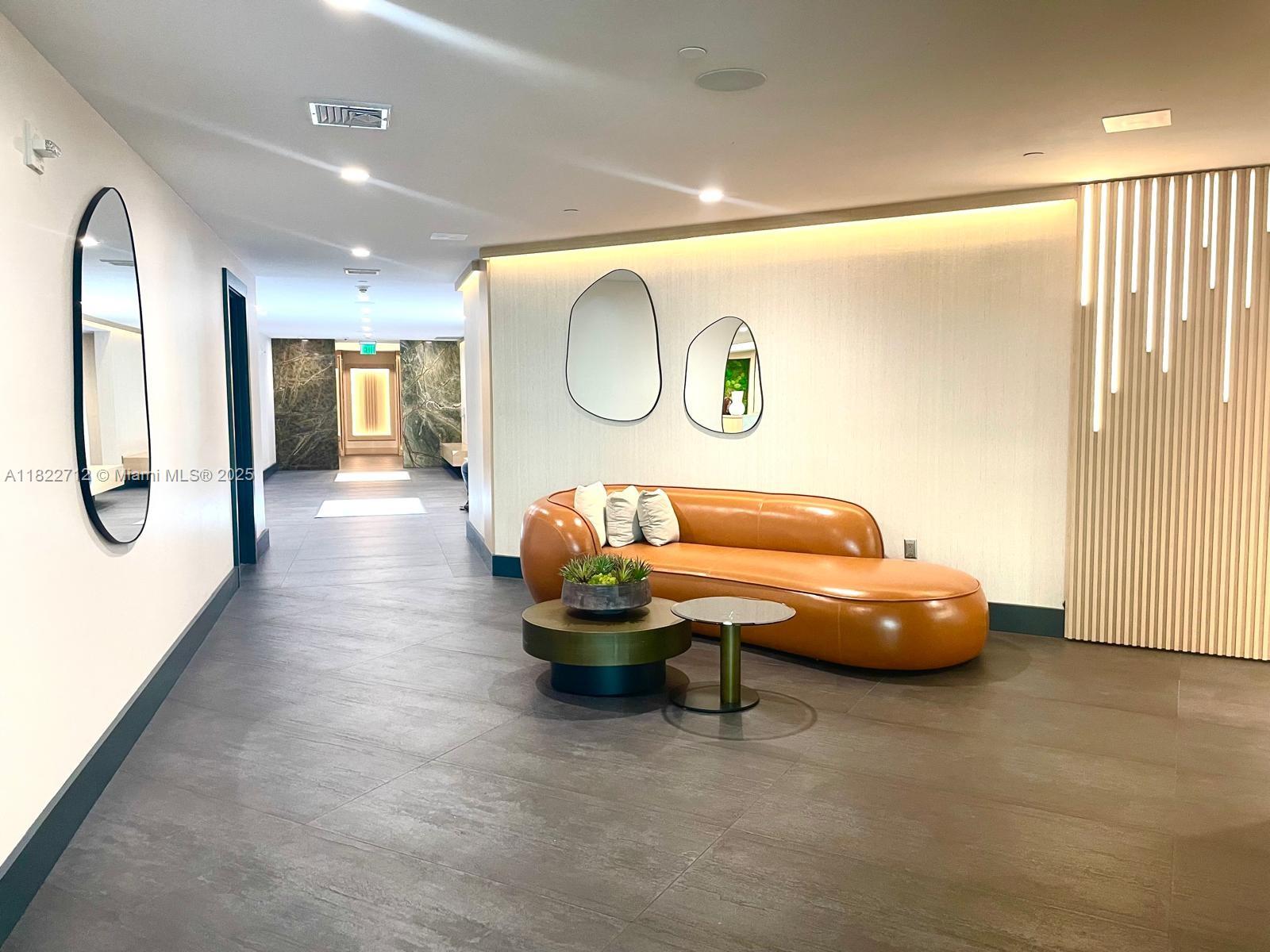 90 Southwest 3rd Street, Unit 3010 Miami, FL 33130 - Photo 24 of 44 a living room with furniture and a large window