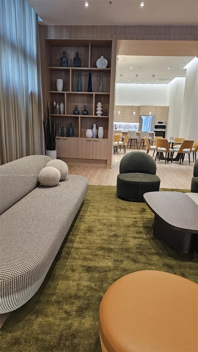 90 Southwest 3rd Street, Unit 3010 Miami, FL 33130 - Photo 28 of 44 a living room with furniture and a rug