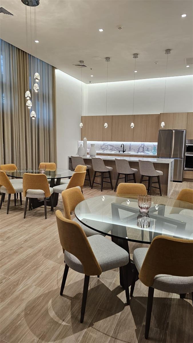 90 Southwest 3rd Street, Unit 3010 Miami, FL 33130 - Photo 30 of 44 a view of a dining room with furniture