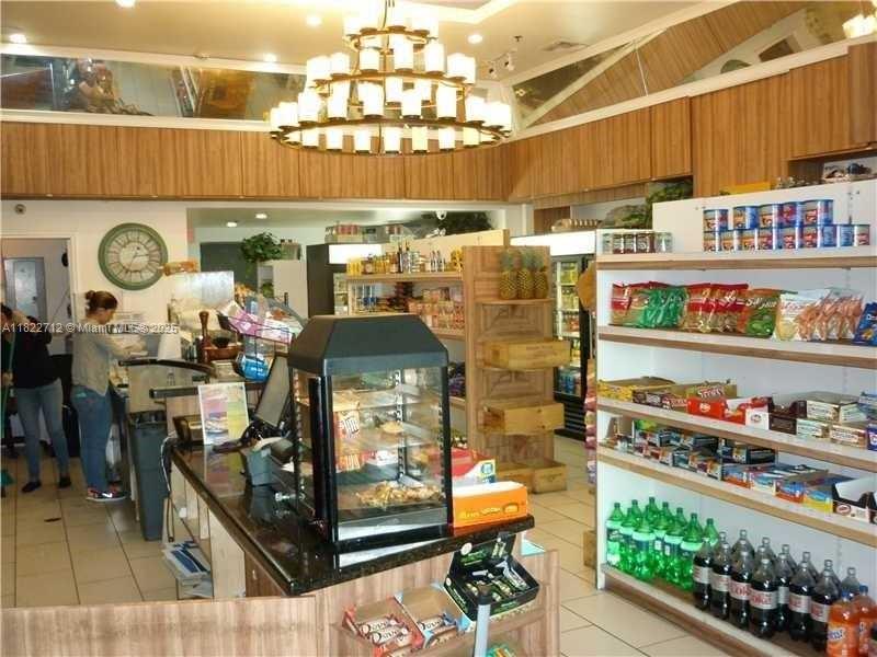 90 Southwest 3rd Street, Unit 3010 Miami, FL 33130 - Photo 42 of 44 a room with lots of different colored cloths