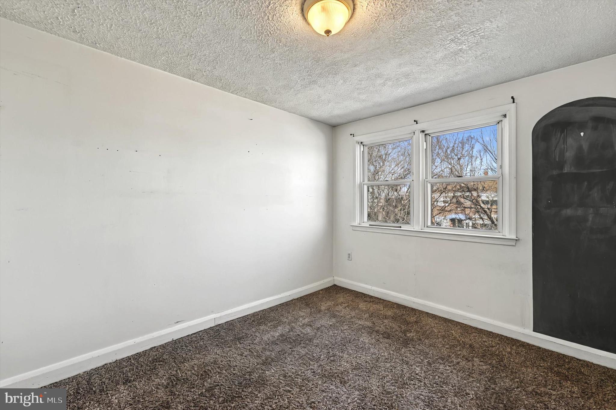 2161 Vailthorn Road Middle River, MD 21220 - Photo 11 of 18 an empty room with windows