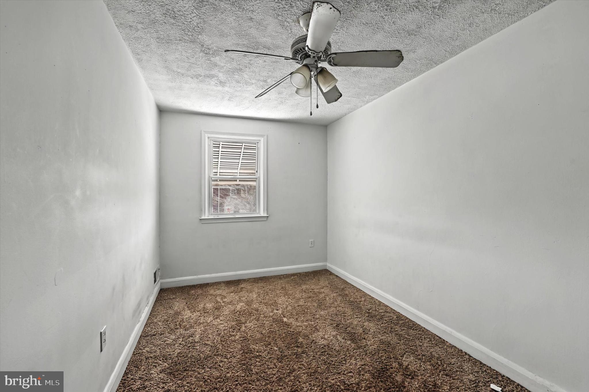 2161 Vailthorn Road Middle River, MD 21220 - Photo 12 of 18 an empty room with a chandelier fan