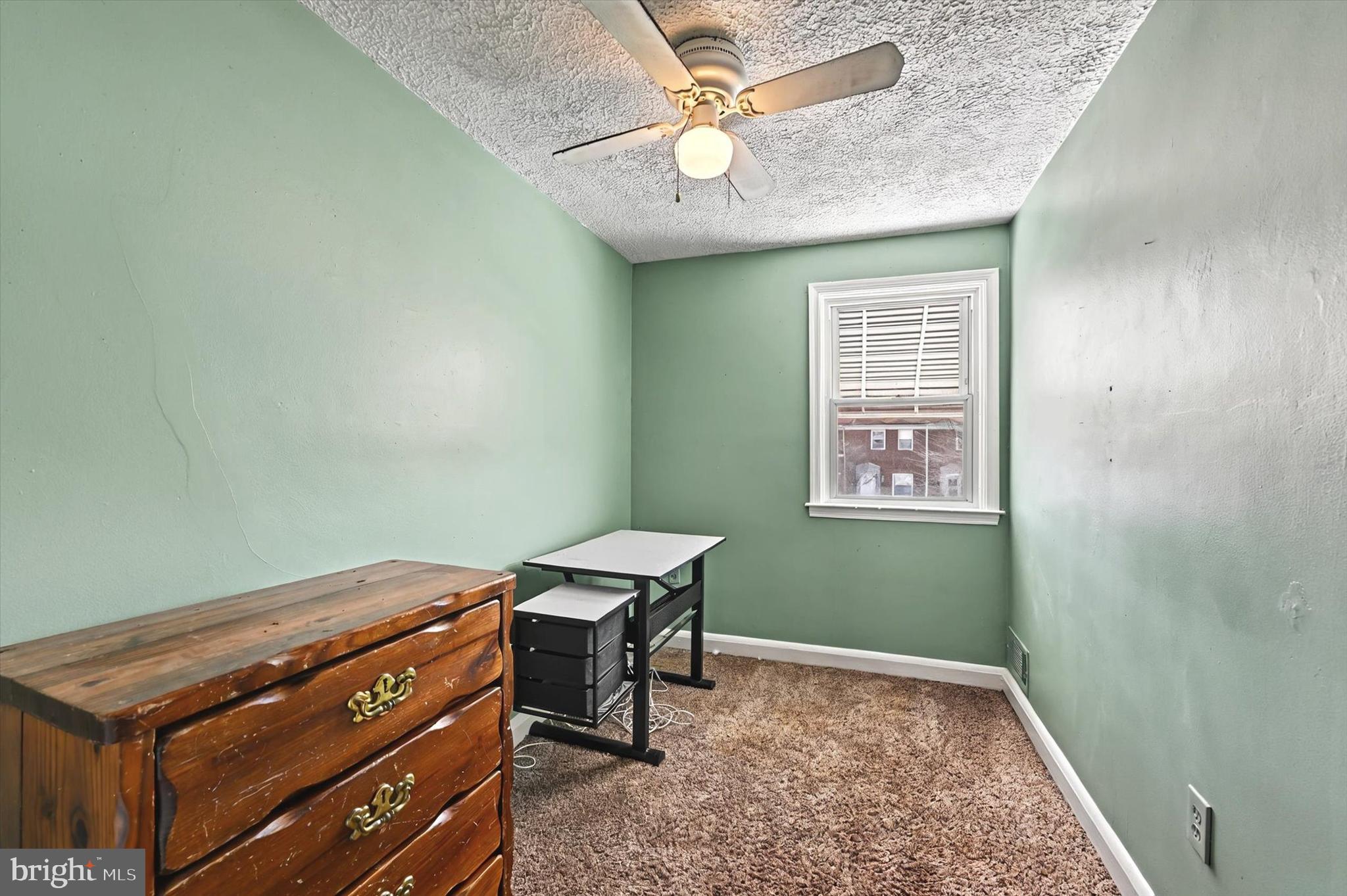 2161 Vailthorn Road Middle River, MD 21220 - Photo 13 of 18 a room with furniture and a window