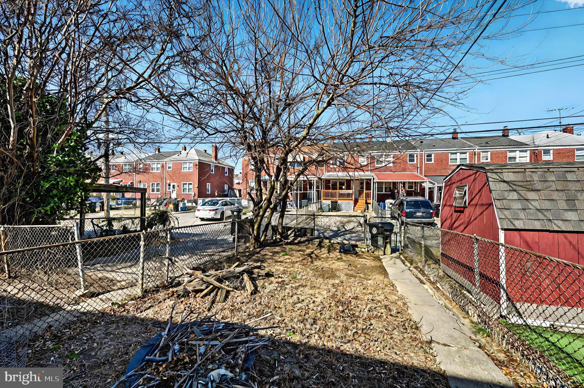 2161 Vailthorn Road Middle River, MD 21220 - Photo 17 of 18 a view of a patio with table and chairs with wooden floor and fence
