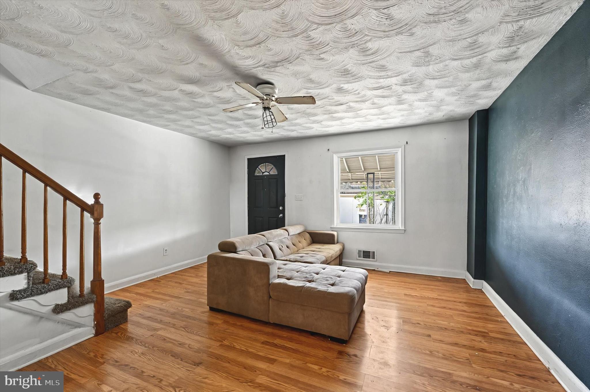 2161 Vailthorn Road Middle River, MD 21220 - Photo 3 of 18 a living room with furniture and a wooden floor